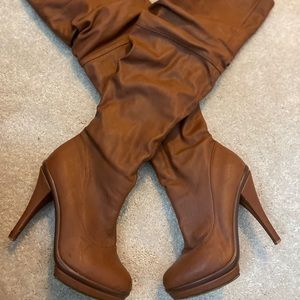 Thigh high brown boots